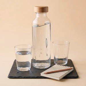 Glass bottle and notepad, learn